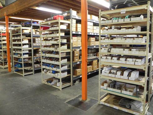 Stocked hydraulic parts shelving in the warehouse