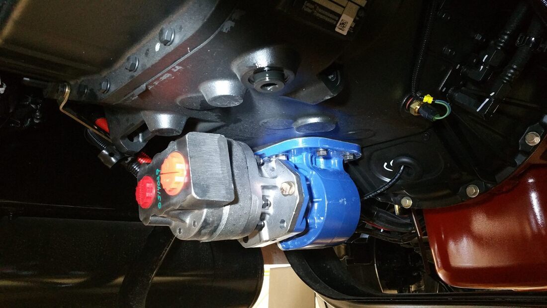 PTO hydraulic pump mounted on a truck driveline