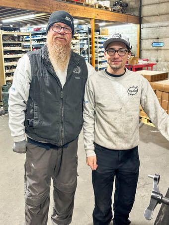 Snake River Hydraulics staff in the shop